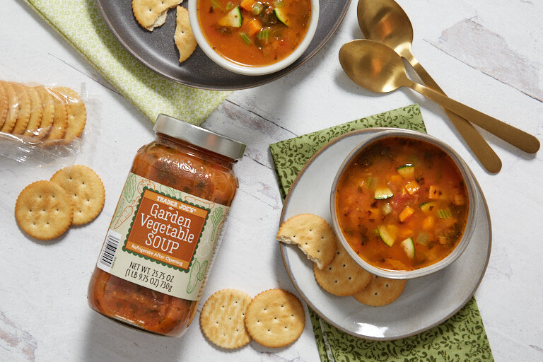 Bowls of Trader Joe's Garden Vegetable Soup with crackers