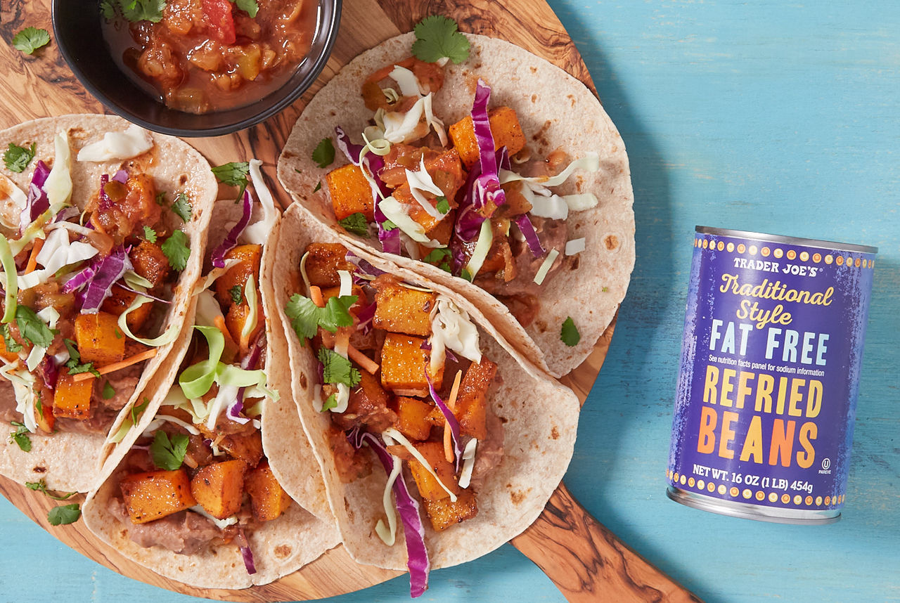 Trader Joe's Traditional Style Fat Free Refried Beans; used in recipe for Squash Tacos, with shredded cabbage, pineapple salsa and cilantro garnish